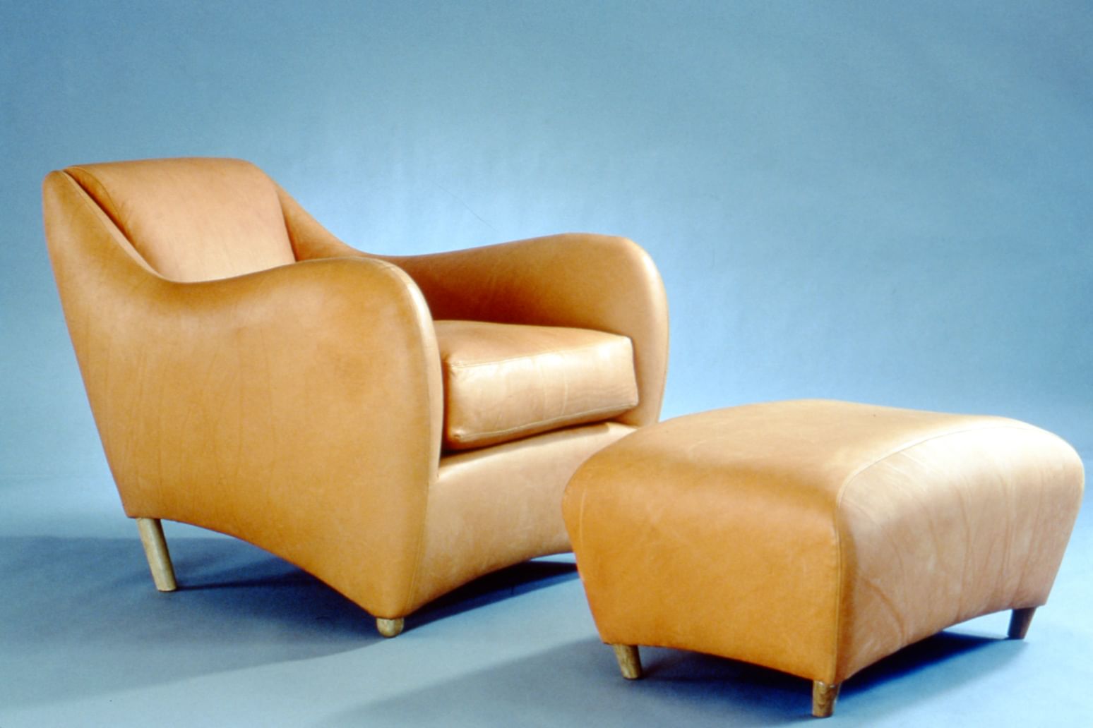 1990's early studio shoot of the Balzac armchair and ottoman.