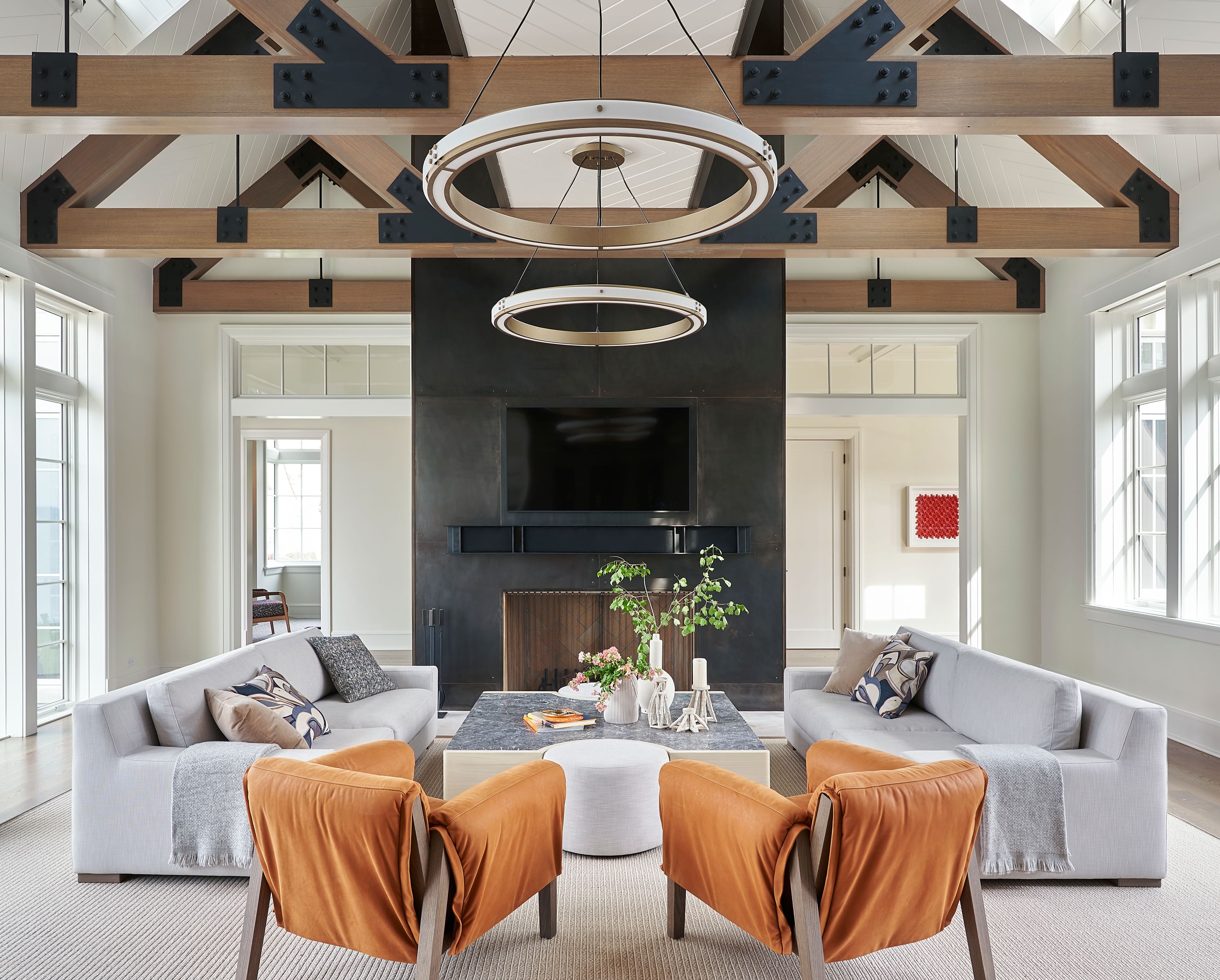 The sumptuous Kent Armchairs by Piet Boon provide a VIP experience in this Lake Geneva great room.