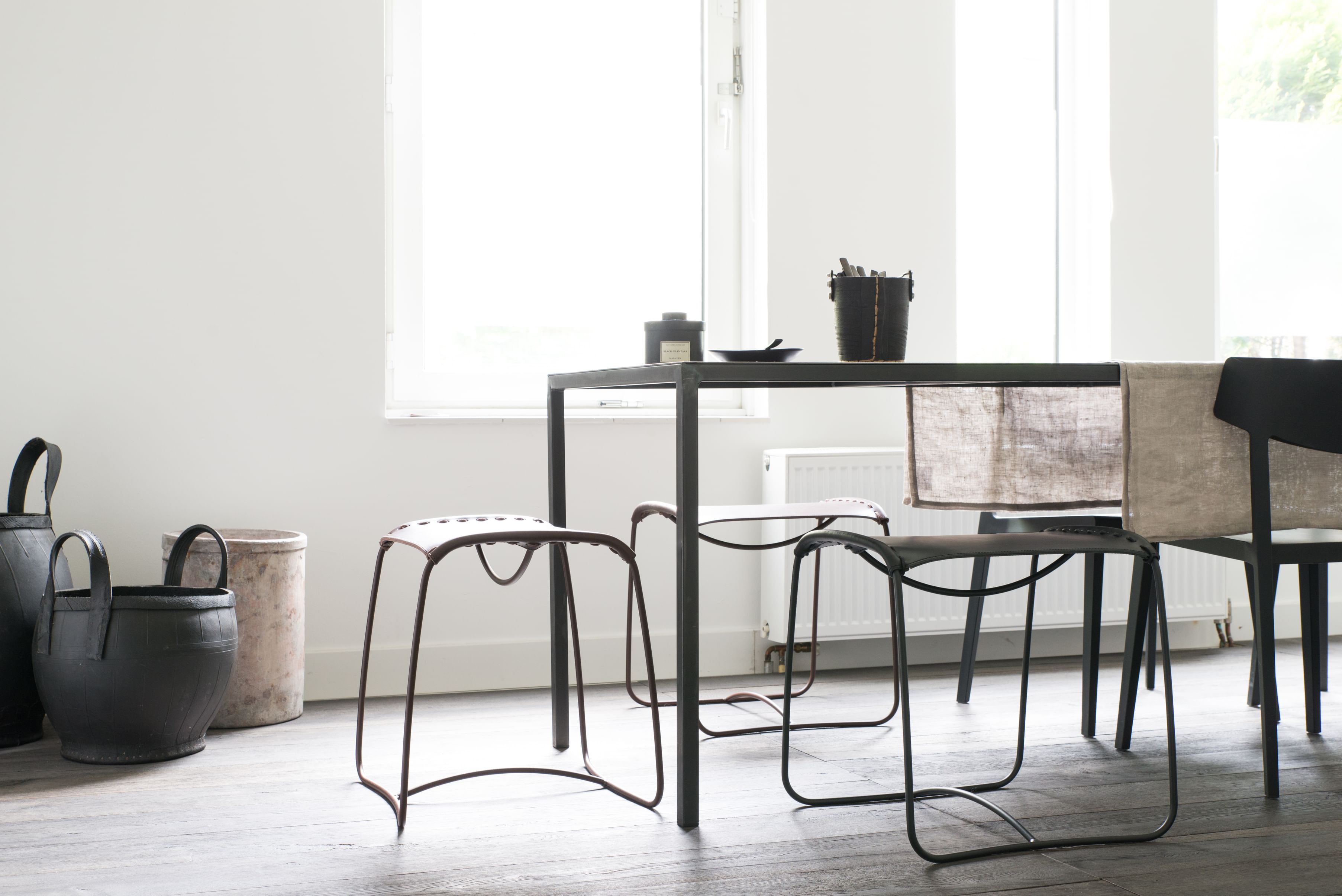 The Perching Stools are family of comfortable stools for flexible use, ideal for our healthier, mobile lives. Designed by Ilse Crawford, they feature hand-stitched leather saddles over a simple wire frame and are perfect for occasional seating.