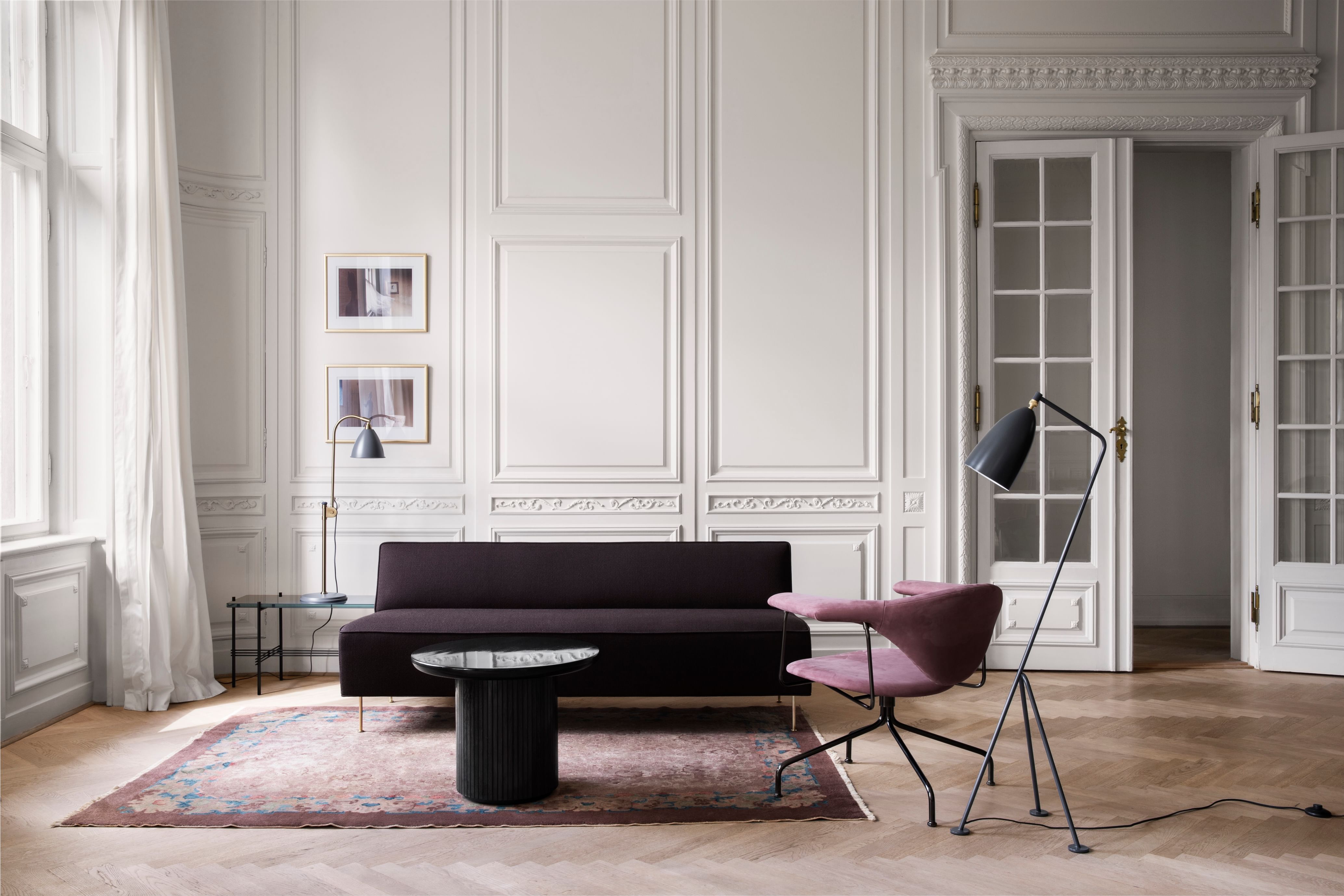 The Modern Line Sofa was designed in 1949 by Greta Grossman. The sofa was one of her most elegant and minimalistic designs, taking inspiration from Grossman's own background in Scandinavian design.