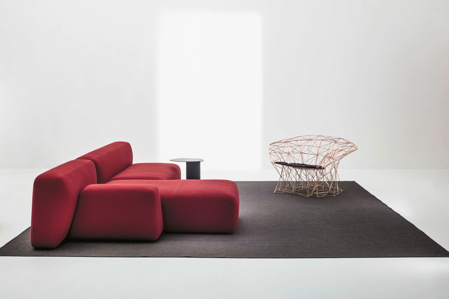 La cividina suiseki sofa red side insitu haute living