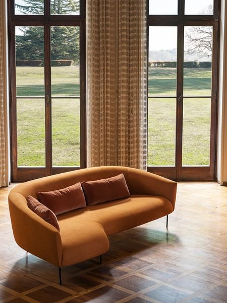 Tacchini furniture roma sofa orange insitu haute living